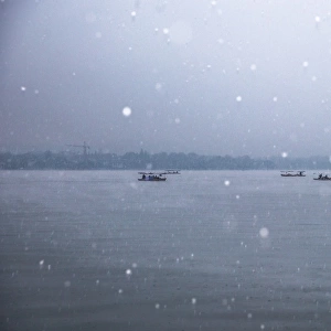 Scenic View Of Silhouette Boats On the West Lake In Snow, Hangzhou