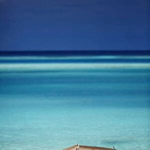 small boat on beach, maldives