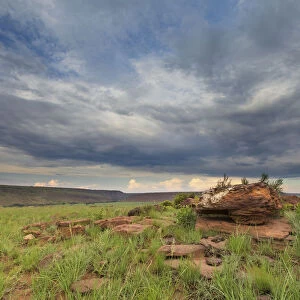 Sunset landscape of a rock against dramatic cloudy sky - Witbank South Africa