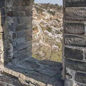 A window cut out over the Great Wall of China