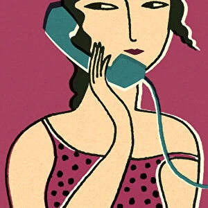 Woman Using a Telephone