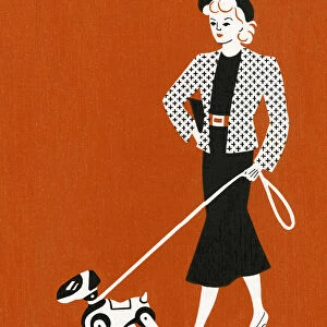 Woman Walking Dog on Leash