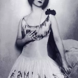 Woman wearing evening gown and pearls (B&W)