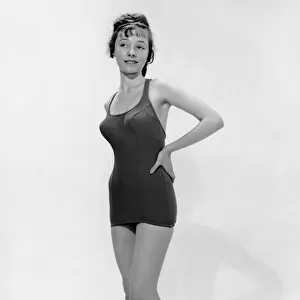 Young woman poses in bathing suit