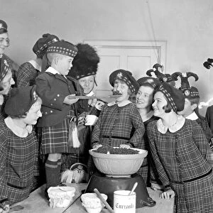 Christmas prepartations at the Royal Caledonian Schools, Bushey. Tasting pudding