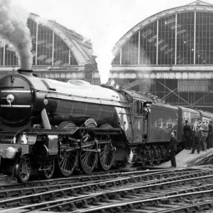 The Flying Scotsman pulls out of Londons Kings Cross station to make the last