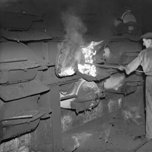 Gravesend Gasworks in Kent. Loading gas coal into retorts. 1939