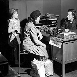 Housing office, Holborn, London, 1946, interviewing applicants, mother and child