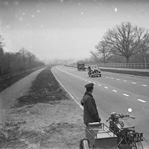 An a patrolman watching the traffic on the new Sidcup By - Pass. 1935