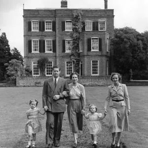 Print of a family strolling in the garden at Ayot House Print of a family strolling in the garden at Ayot House