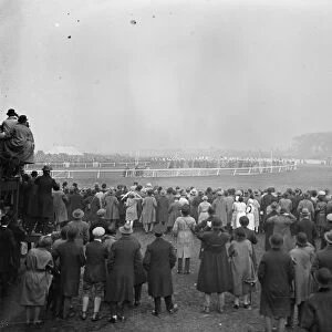 Sensational Grand National. Spectators looking in the mist at the start. 30 March