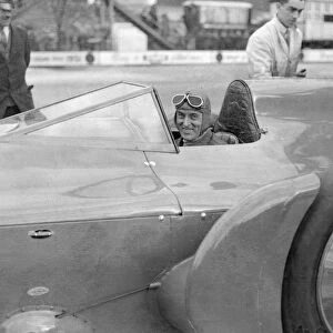 Sir Malcolm Campbell in cockpit of his car Bluebird at Brooklands track Easter Monday