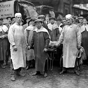 Smithfield Market meat porters in new headgear and smocks, approved by Minister of Health