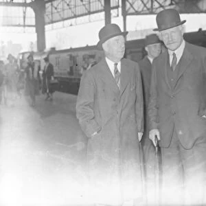 Thomas Lamont ( left ), famous American banker, arrives. A partner in the J P
