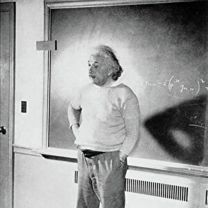 Albert Einstein in his study at the Institute of Advanced Study, Princeton, USA, 1940 (b/w photo)