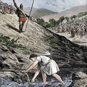 Biblical scene: David taking the stone and throwing it at Goliath, a Philistine warrior, to kill him. Colouring engraving of the 19th century