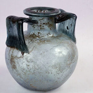 Blue glass cinerary urn with striated handles