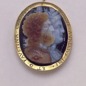 Cameo, bearing images of Serapis and Isis, in 16th century gold frame bearing the names of Marcus Antoninius and his wife Faustina (sardonyx)