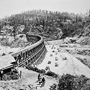 Chinese labourers working on a trestle bridge on the western slope of the Sierra Nevada