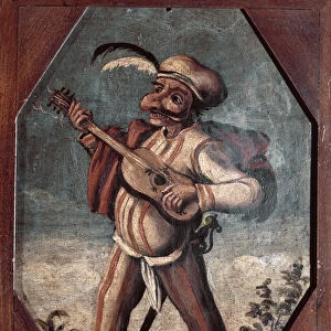 Commedia dell arte: the character of Pulcinella playing the guitar