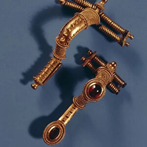 Two curved brooches, from Hassleben, Thuringia (gold & gems)