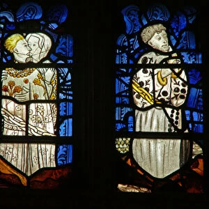 The east window depicting the Seven Deadly Sins: Lust (L) and Sloth (R) (stained glass)