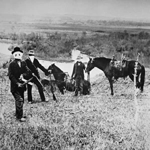 Farmer-homesteaders of Nebraska cutting fences of cattlemen in Custer County