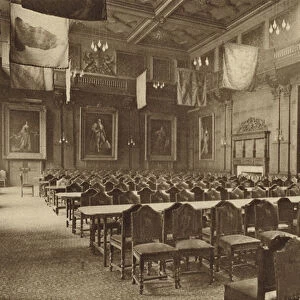 Flag-hung Great Hall in which the Company of Grocers holds its banquets in the City of London (b / w photo)
