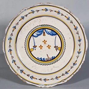 French Revolution: Plate flowers of lilies and sword. Ceramic of the 18th century