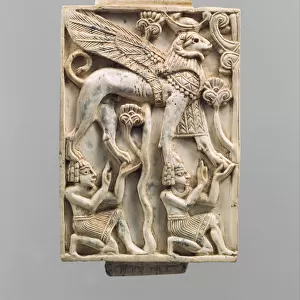 Furniture plaque carved in relief with a ram-headed sphinx, c. 9th-8th century B. C