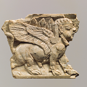 Furniture plaque carved in relief with sphinx, c. 9th-8th century B. C. (ivory)