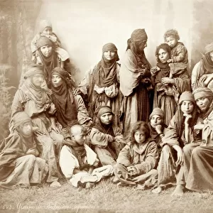 Group of 17 Bedouin women and children, c. 1867-98 (b / w photo)
