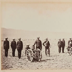 A group of soldiers with two Gatling guns, 1879 (b / w photo)