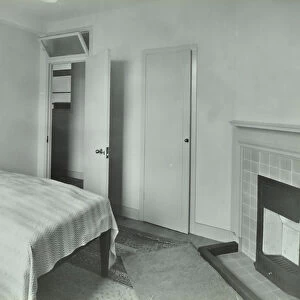 Kingsmead Estate: interior of flat, bed and fireplace, London, 1939 (b / w photo)