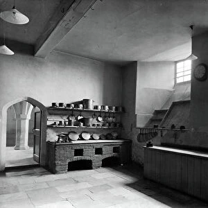 The kitchen at Lulworth Castle, Dorset, from England's Lost Houses by Giles Worsley (1961-2006) published 2002 (b/w photo)