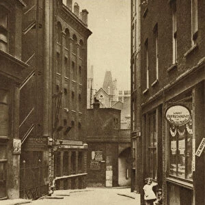 What is left of the steep bank of the Holebourne from the summit and the base: looking down Fleet Lane towards Farringdon Street (b / w photo)