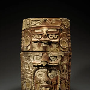 A Mayan cache vessel carved on one side with the face of Sun God, Kinich Ahaw Or G-I, c