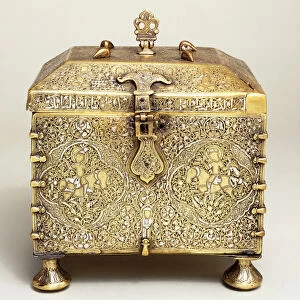 A Mesopotamian silver inlaid brass casket, with dials for a combination lock (front view)