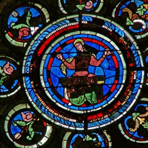 Detail from the north rose window depicting Arithmetic from the Liberal Arts