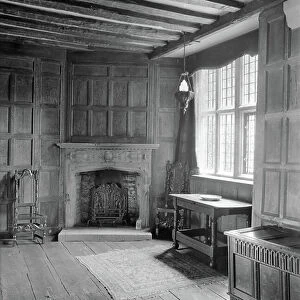 An oak-panelled bedroom, Little Sodbury Manor, Gloucestershire, view from the front porch, from Country Houses of the Cotswolds (b/w photo)