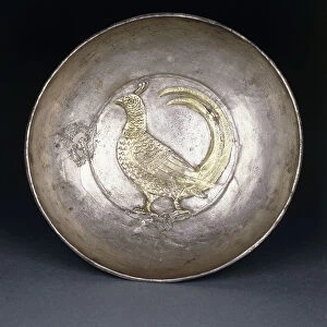 A post-Sasanian silver dish containing a repousse gold pheasant, c. 8th century AD (silver, gold)
