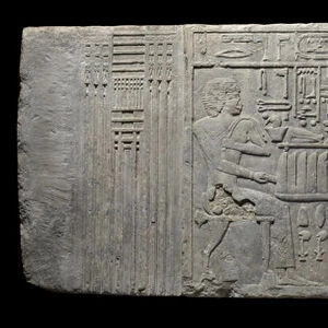 The priest Sheri and his wife Khenteyetka, with funerary offerings