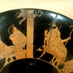 Red ceramic figure cup representing "Oedipus and sphinx"