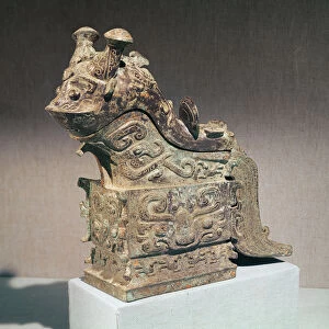 Ritual kuang wine mixer in the shape of a monster inscribed with jih chi