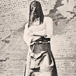 Scottish soldier wearing gas mask in 1915, from The War Illustrated deLuxe