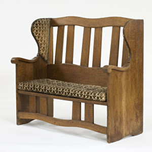Settle, c. 1895 (joined solid oak with a webbing seat and upholstered velvet cushion)