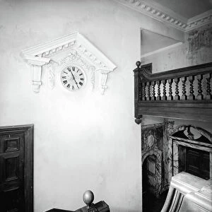 The staircase at Dunsland House, Devon, from England's Lost Houses by Giles Worsley (1961-2006) published 2002 (b/w photo)