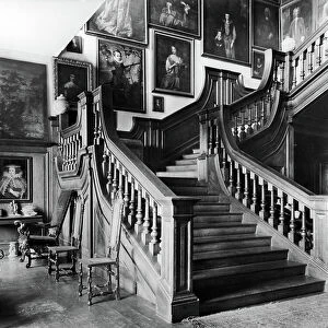 The staircase, Rushbrooke Hall, Suffolk, from England's Lost Houses by Giles Worsley (1961-2006) published 2002 (b/w photo)