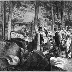 Tourists at the gorges of Apremont, near the entrance of the cave
