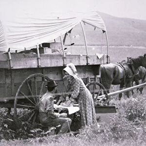 Typical pioneers covered wagon (b / w photo)